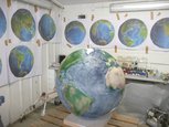 airbrushing rounds the terrestrial globe